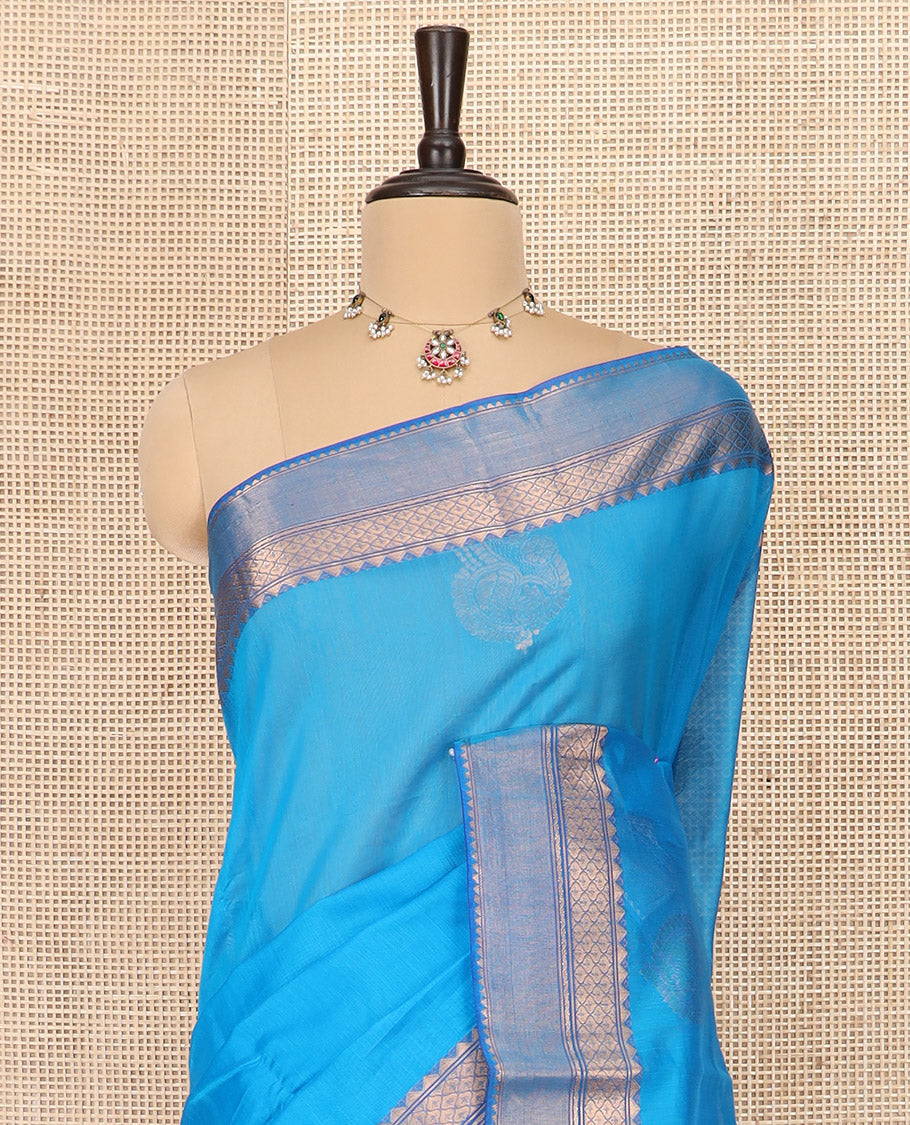 Blue Silk Cotton Saree Bedecked with Zari Buttas All Over the Body, Highlighted with Contrast Traditional Zari Border, Contrast Pallu Elevated with Jaal Design, and Paired with a Contrast Blouse