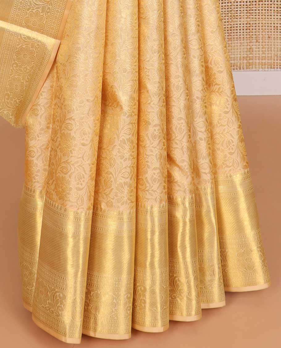 Cream floral vine design silk saree with self border of intricate zari design border & floral design pallu