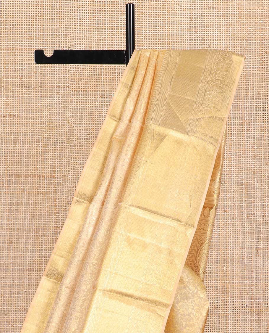Cream floral vine design silk saree with self border of intricate zari design border & floral design pallu