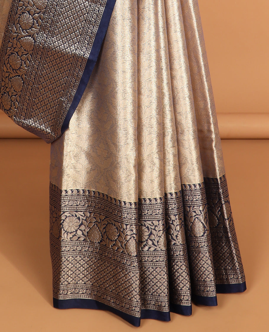 Grey floral jacquard semi tissue saree with contrast floral design border & checked zari design pallu