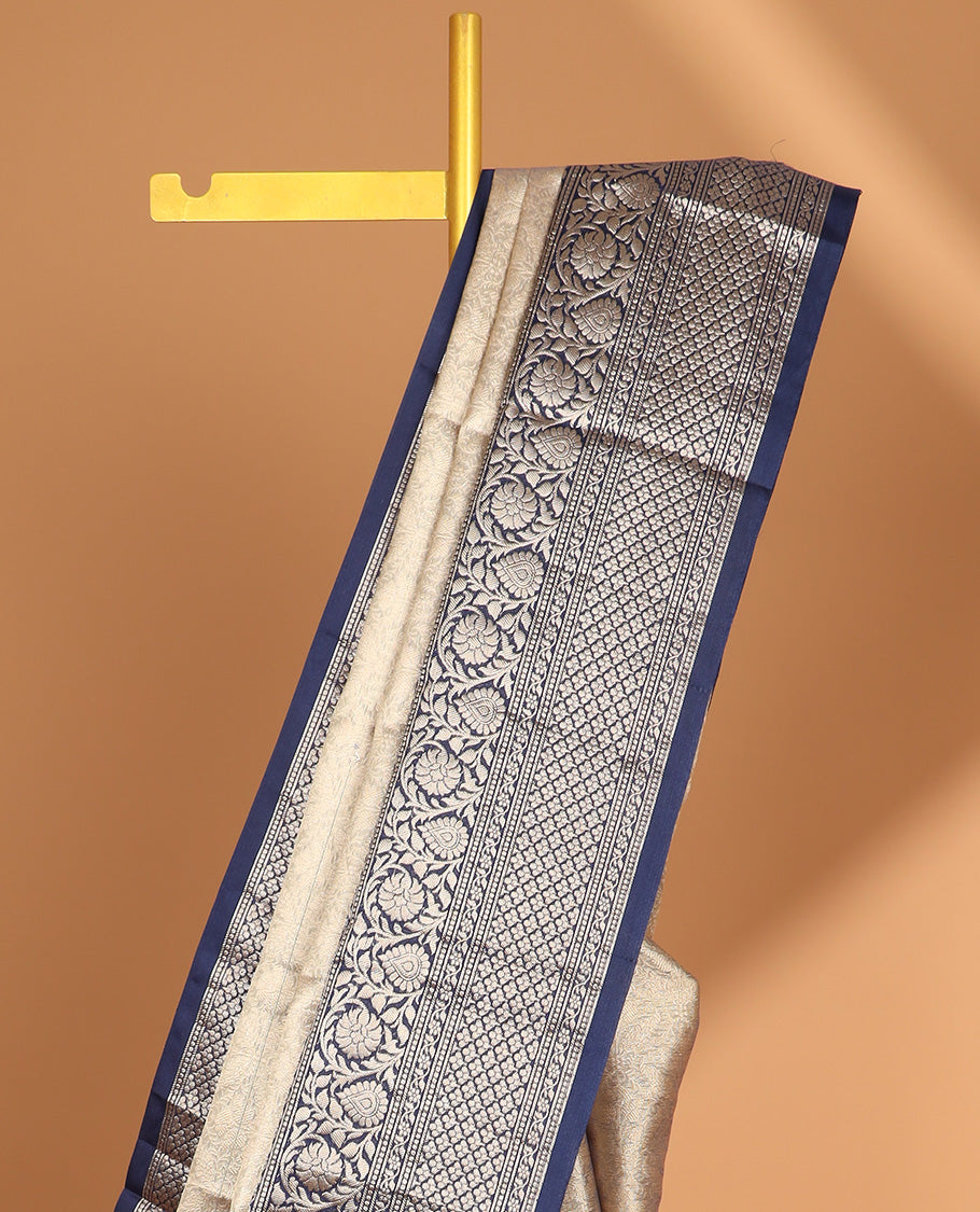 Grey floral jacquard semi tissue saree with contrast floral design border & checked zari design pallu