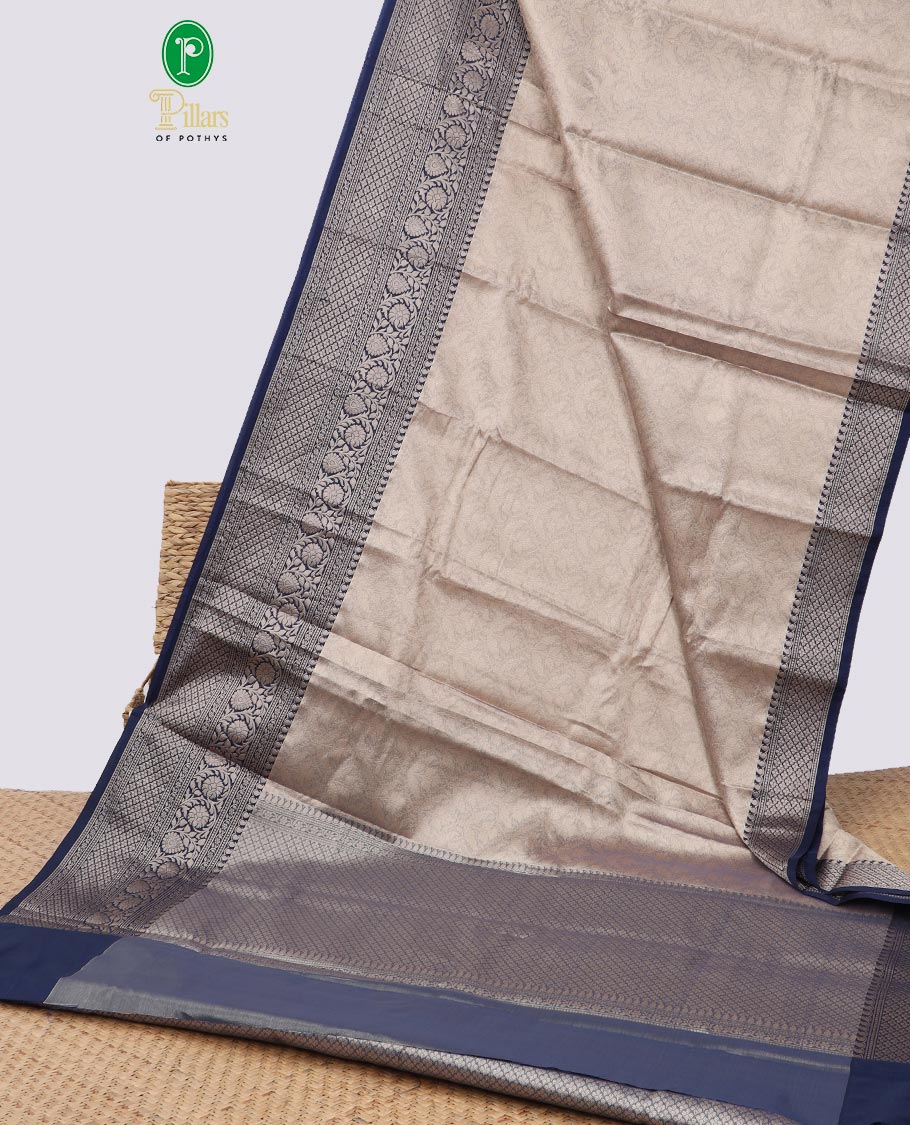 Grey floral jacquard semi tissue saree with contrast floral design border & checked zari design pallu