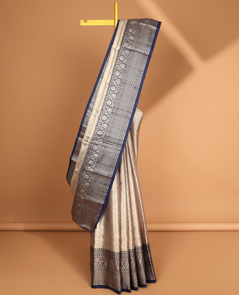 Grey floral jacquard semi tissue saree with contrast floral design border & checked zari design pallu