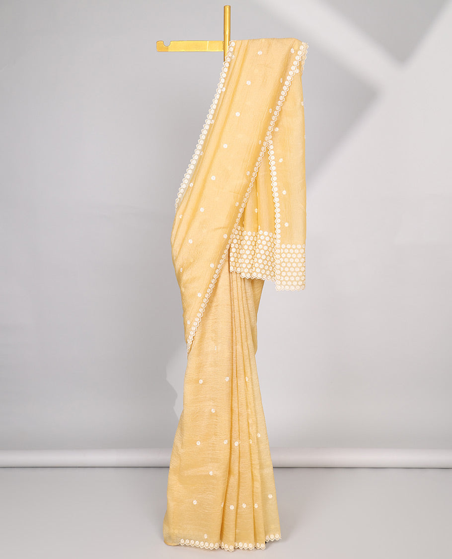 Pink Crushed Tissue saree with scallop motif border and intricate motif embroidery pallu