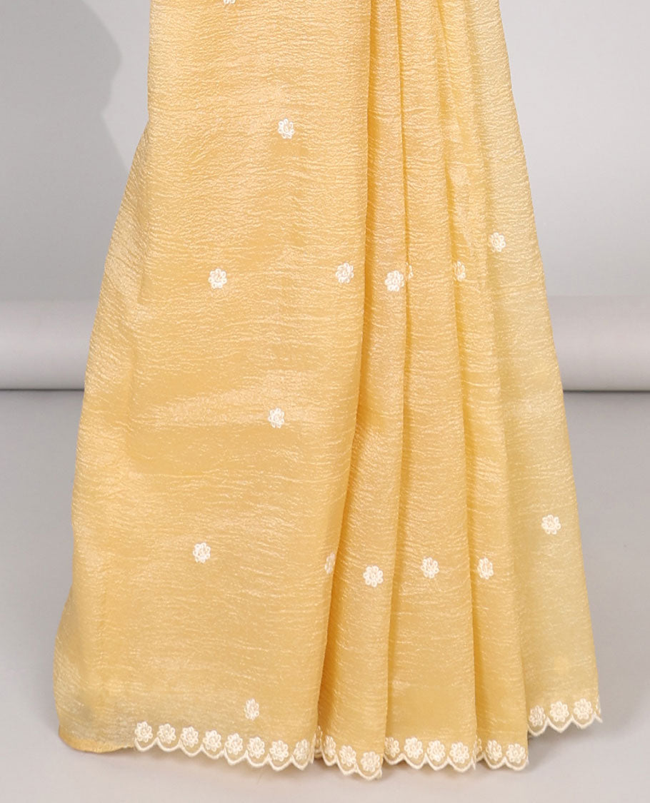 Pink Crushed Tissue saree with scallop motif border and intricate motif embroidery pallu