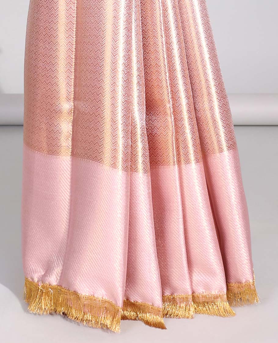 Pastel pink zig zag striped tissue saree with self striped border & intricate zari design pallu
