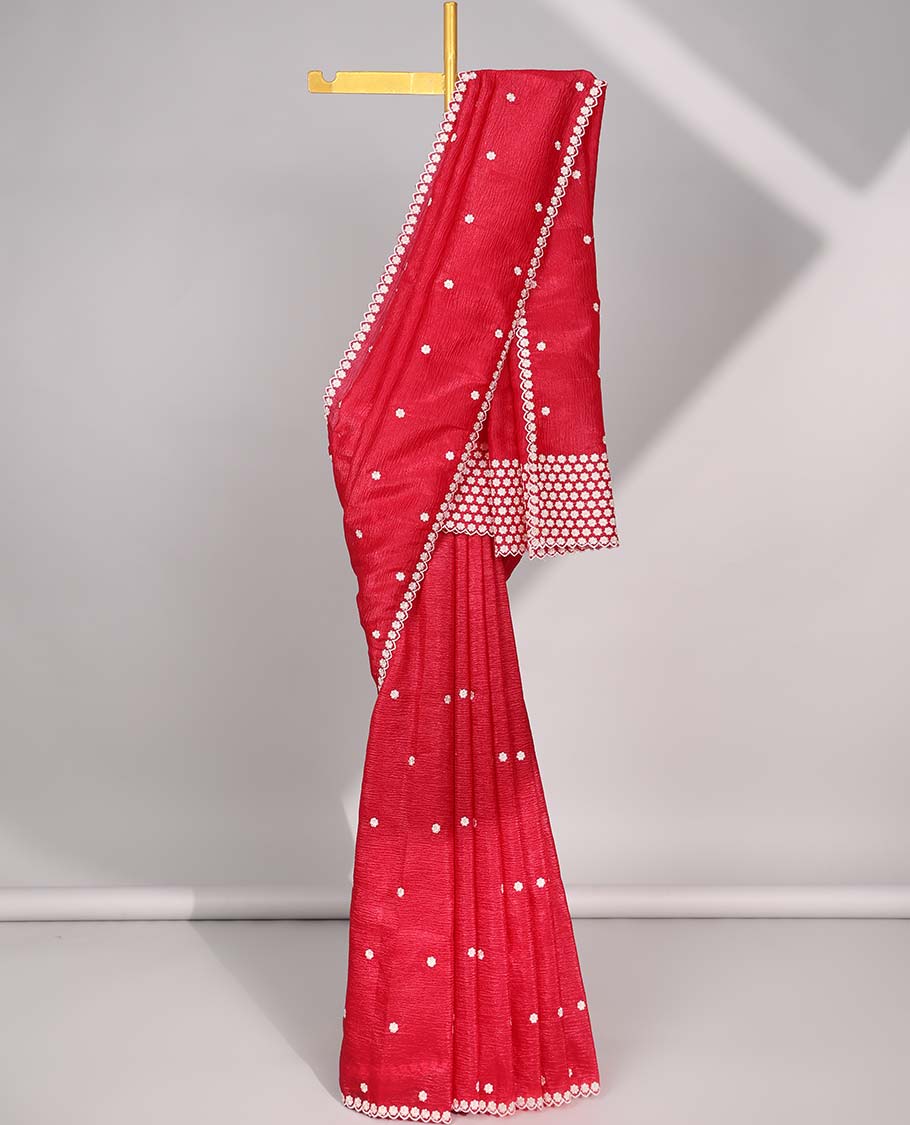 Red crushed tissue saree with all-over floral motifs embroidered & floral scallop border