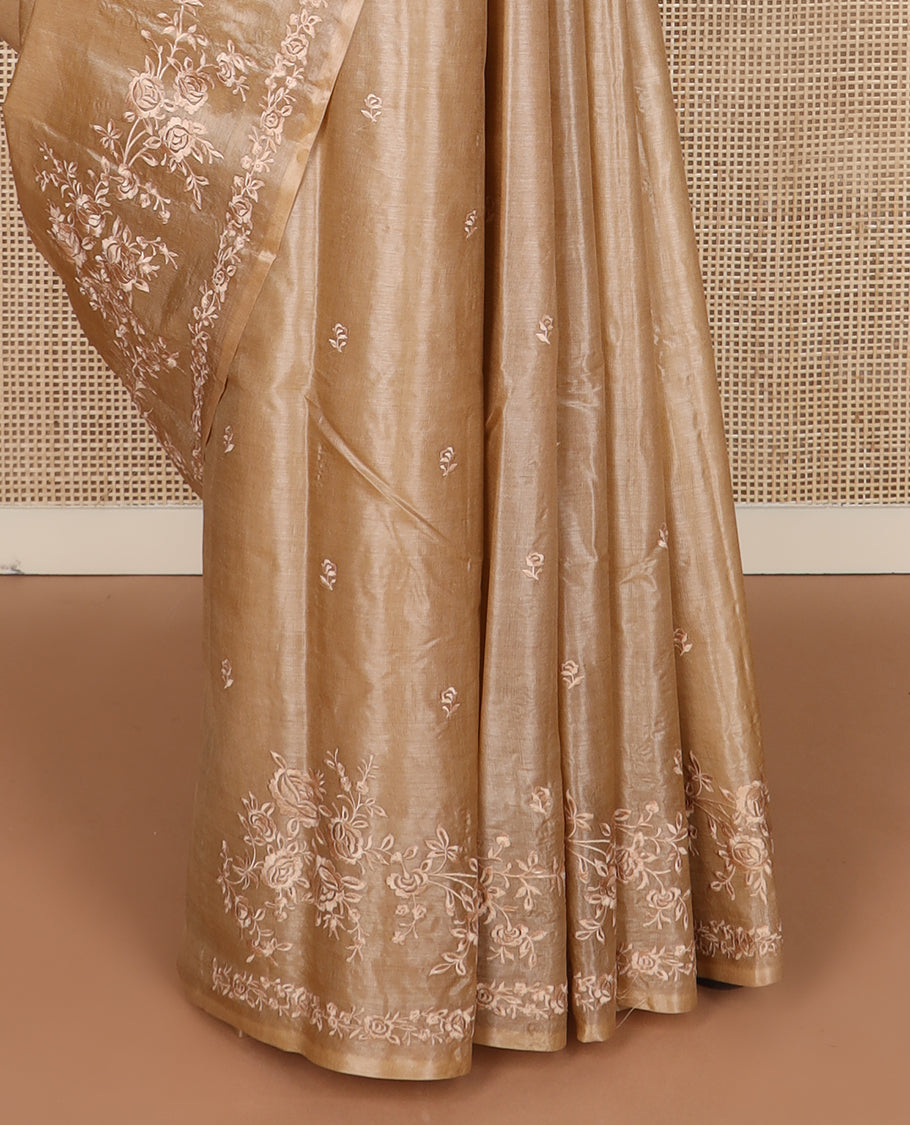 Sandal floral motifs thread embroidered tussar saree, floral embroidered border