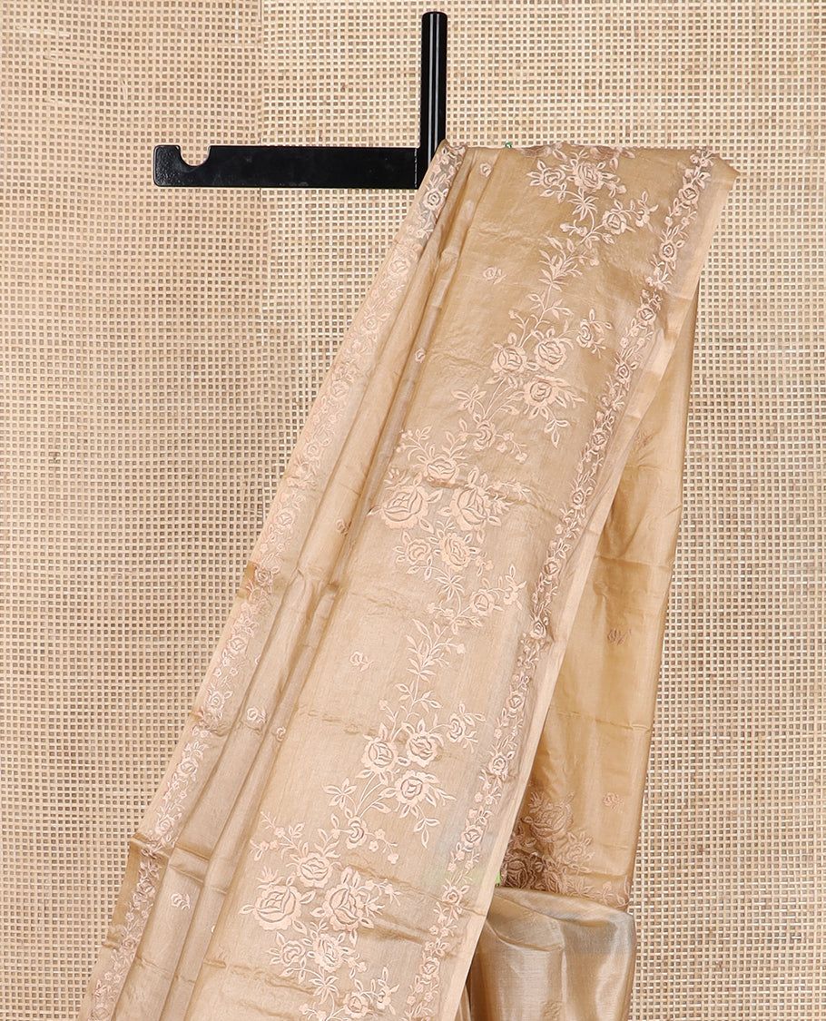 Sandal floral motifs thread embroidered tussar saree, floral embroidered border