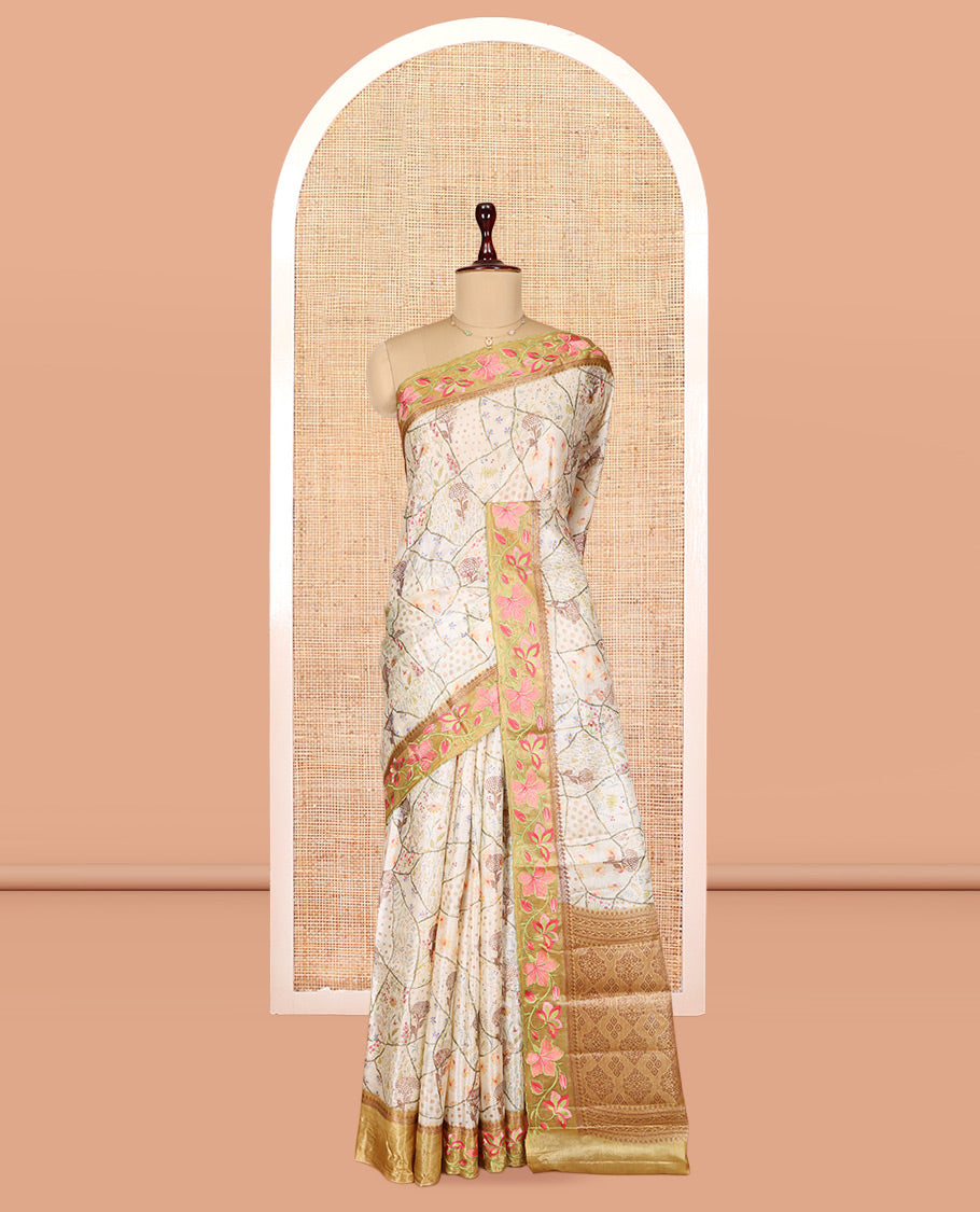 Cream Tusser Silk Saree Features Floral Vine Design, a Contrast Floral Embroidered Border, and a Contrast Blouse