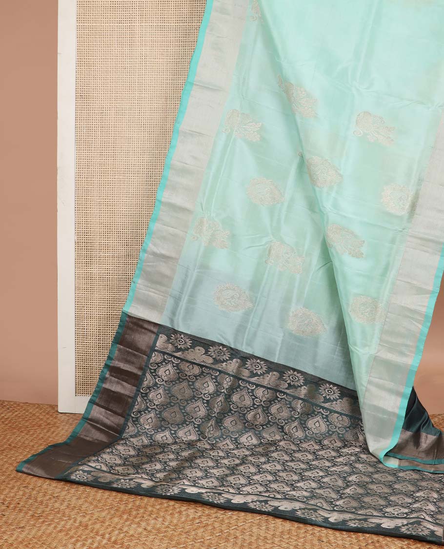Light blue motifs uppada silk saree with self zari border & floral design pallu