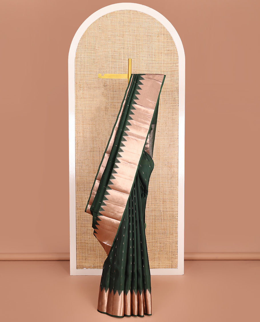 Green Vasundhara Lite-Silk Mix Saree, Spotlighted with Zari Buttas All Over Its Body, Highlighted by a Thazampoo Rekku Border, Meticulously Crafted Pallu, and Paired with a Matching Blouse