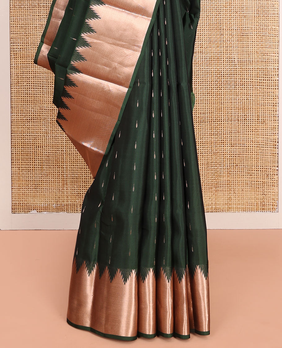 Green Vasundhara Lite-Silk Mix Saree, Spotlighted with Zari Buttas All Over Its Body, Highlighted by a Thazampoo Rekku Border, Meticulously Crafted Pallu, and Paired with a Matching Blouse