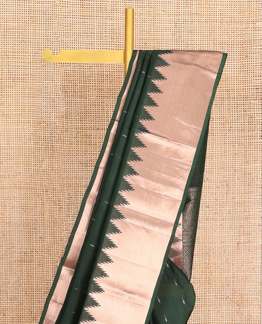 Green Vasundhara Lite-Silk Mix Saree, Spotlighted with Zari Buttas All Over Its Body, Highlighted by a Thazampoo Rekku Border, Meticulously Crafted Pallu, and Paired with a Matching Blouse