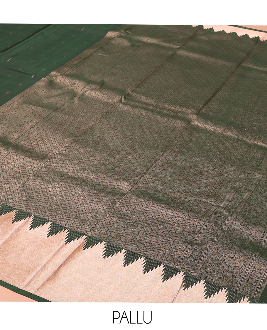 Green Vasundhara Lite-Silk Mix Saree, Spotlighted with Zari Buttas All Over Its Body, Highlighted by a Thazampoo Rekku Border, Meticulously Crafted Pallu, and Paired with a Matching Blouse