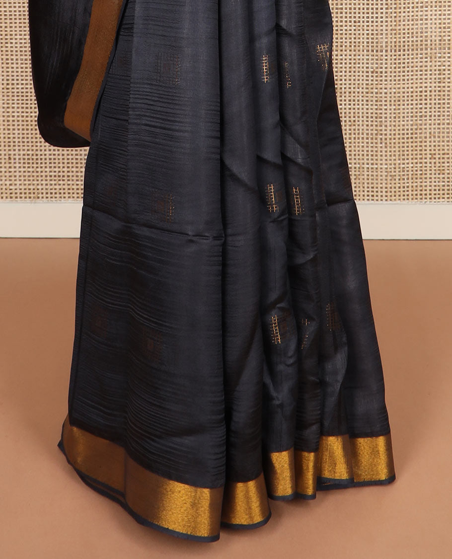Black buttas banana pith saree, zari border, and zari striped pallu