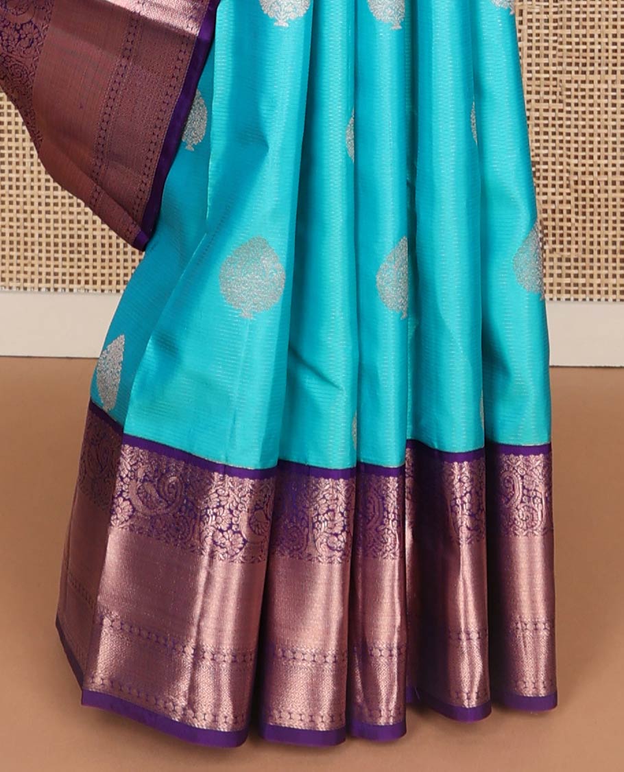 Light blue striped, buttas silk saree with contrast intricate zari design border & floral design pallu