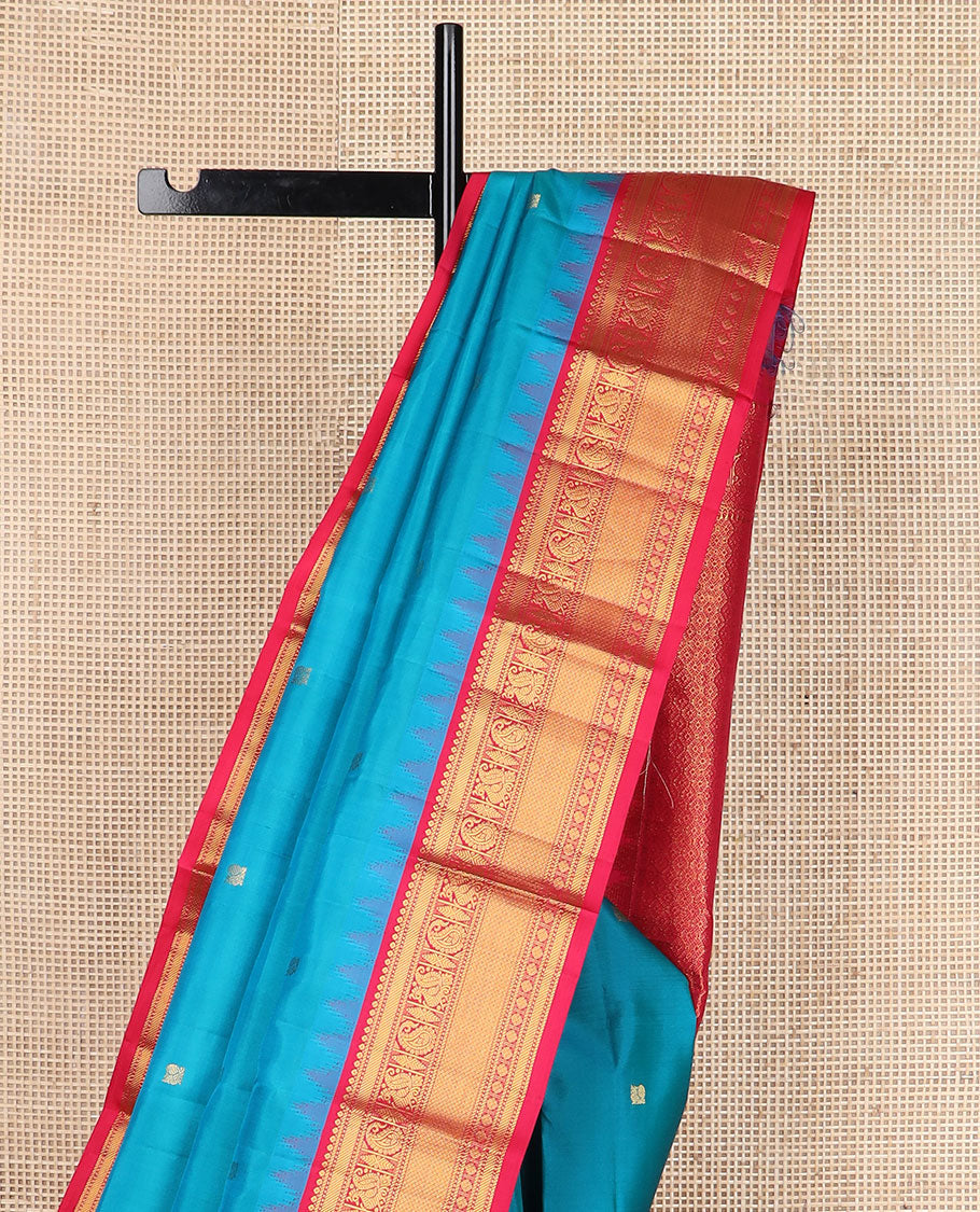Blue mayil buttas silk saree, contrast border of thazampoo rekku,banaras,manga,mayil,diamond & mayil kann & intricate pallu