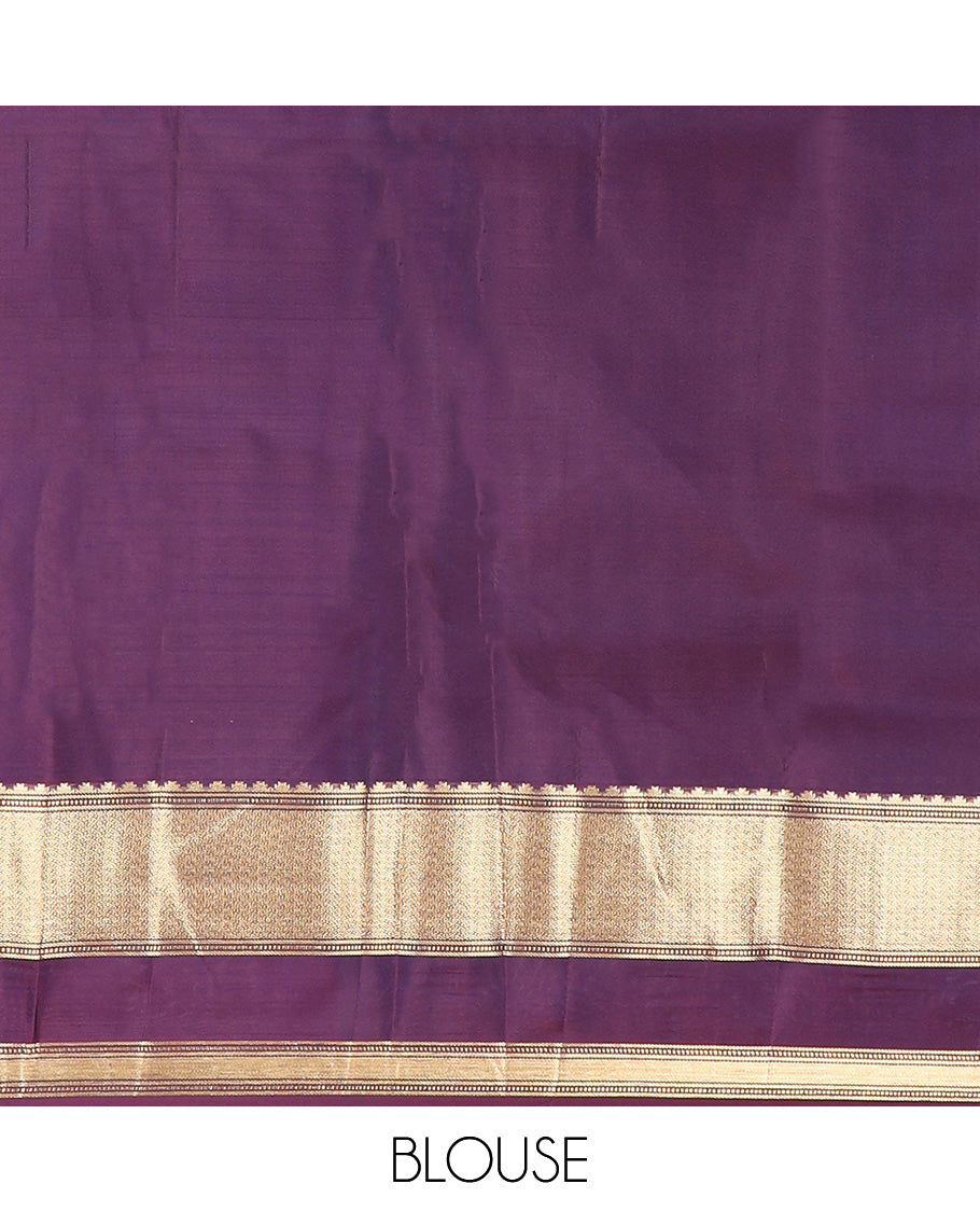 Grey micro-checked silk saree, contrast rettai pettu border of thazampoo rekku, banaras, muthu, and geometric designs, and jaal pallu
