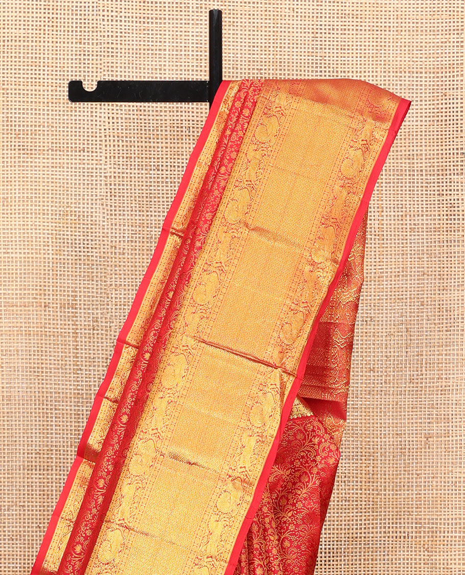 Red Kanchipuram Wedding Silk Saree, Beautifully Bedecked with Floral Jacquard Design on Its Body, Highlighted by a Zari Border of Salngai, Rudraksham, Mayil, Kuthirai, and Jaal Designs, Grand Jaal Pallu, and Paired with a Matching Blouse