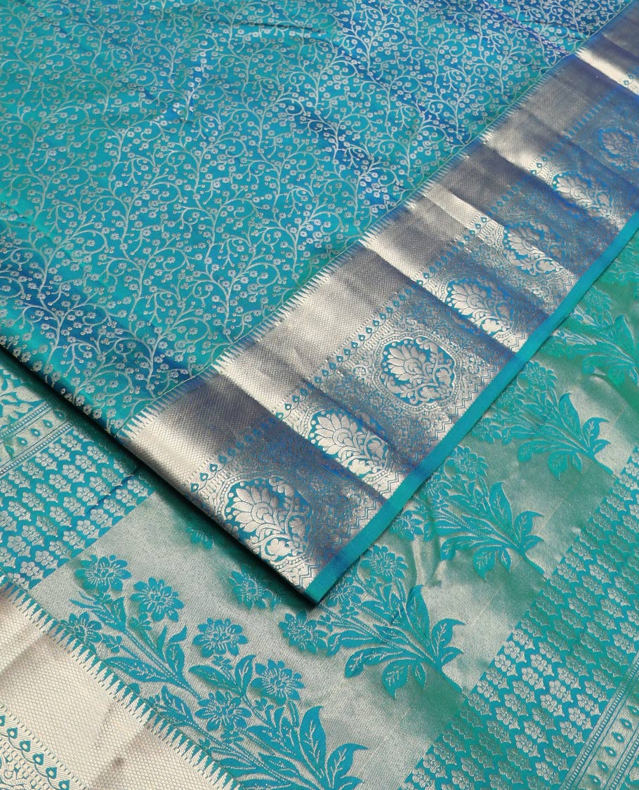 Blue jacquard Kanchipuram wedding silk saree, zari border of rekku, kuyil kann, thilakam mokku, Muthu, and floral design, and floral design pallu