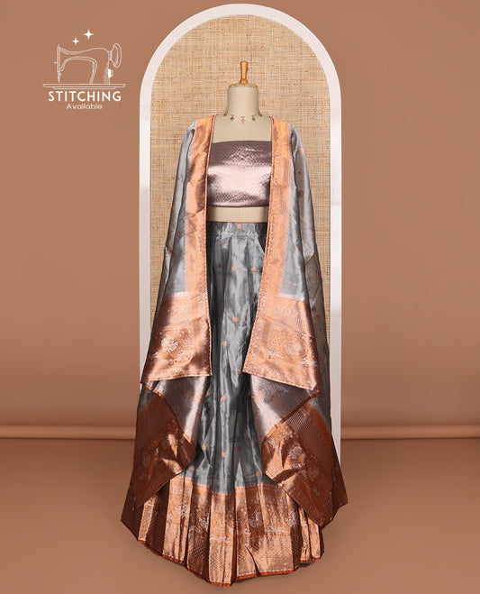 Blue grey buttas tissue half saree with contrast zari design border, floral design blouse & floral design dhavani