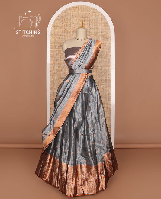 Blue grey buttas tissue half saree with contrast zari design border, floral design blouse & floral design dhavani