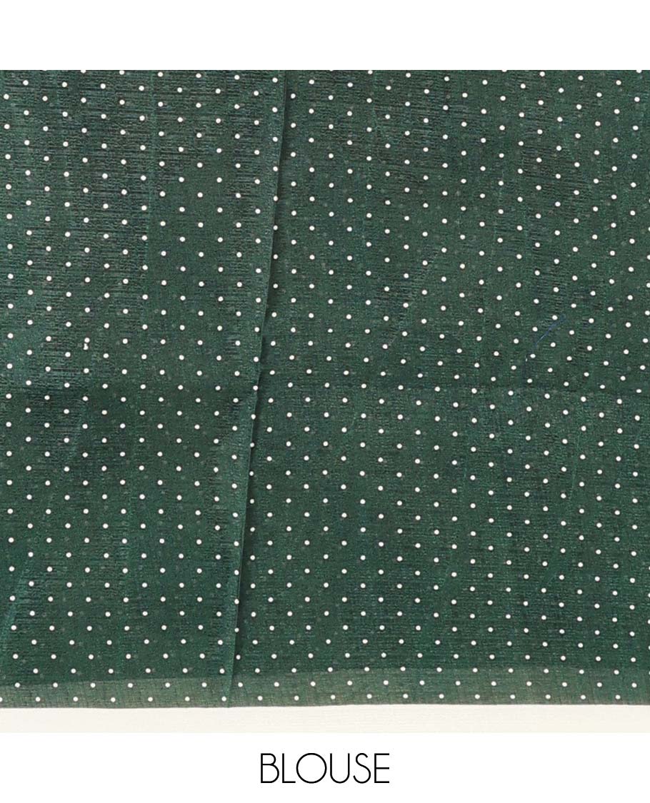 White base saree steeped with big green polka dots, plain border, and pallu of polka dots