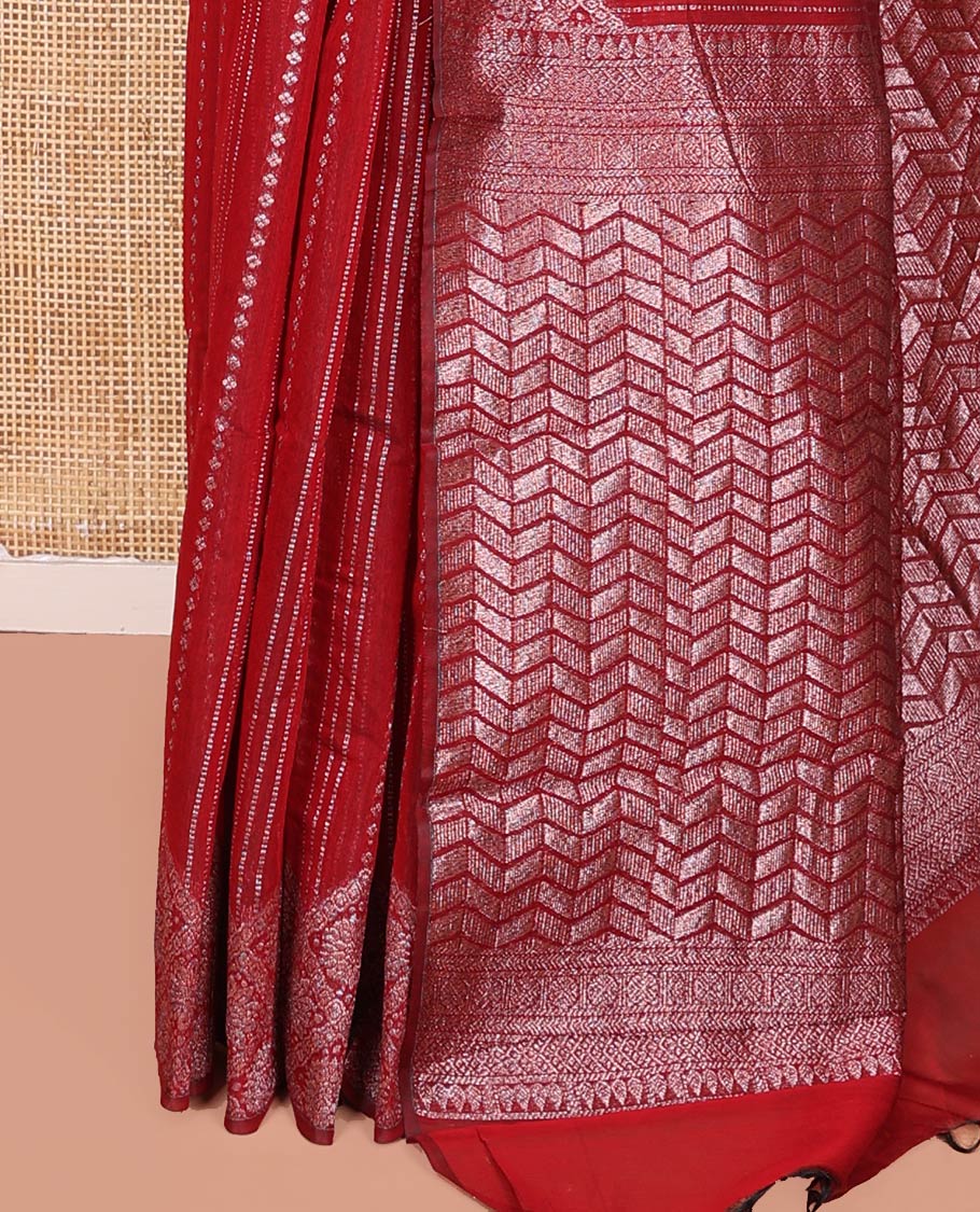 Borderless Red Semi-Silk Cotton Saree, Gracefully Embellished with Traditional Zari Designs on Its Body, Highlighted by Pallu of Chevron Designs, and Paired with a Matching Blouse