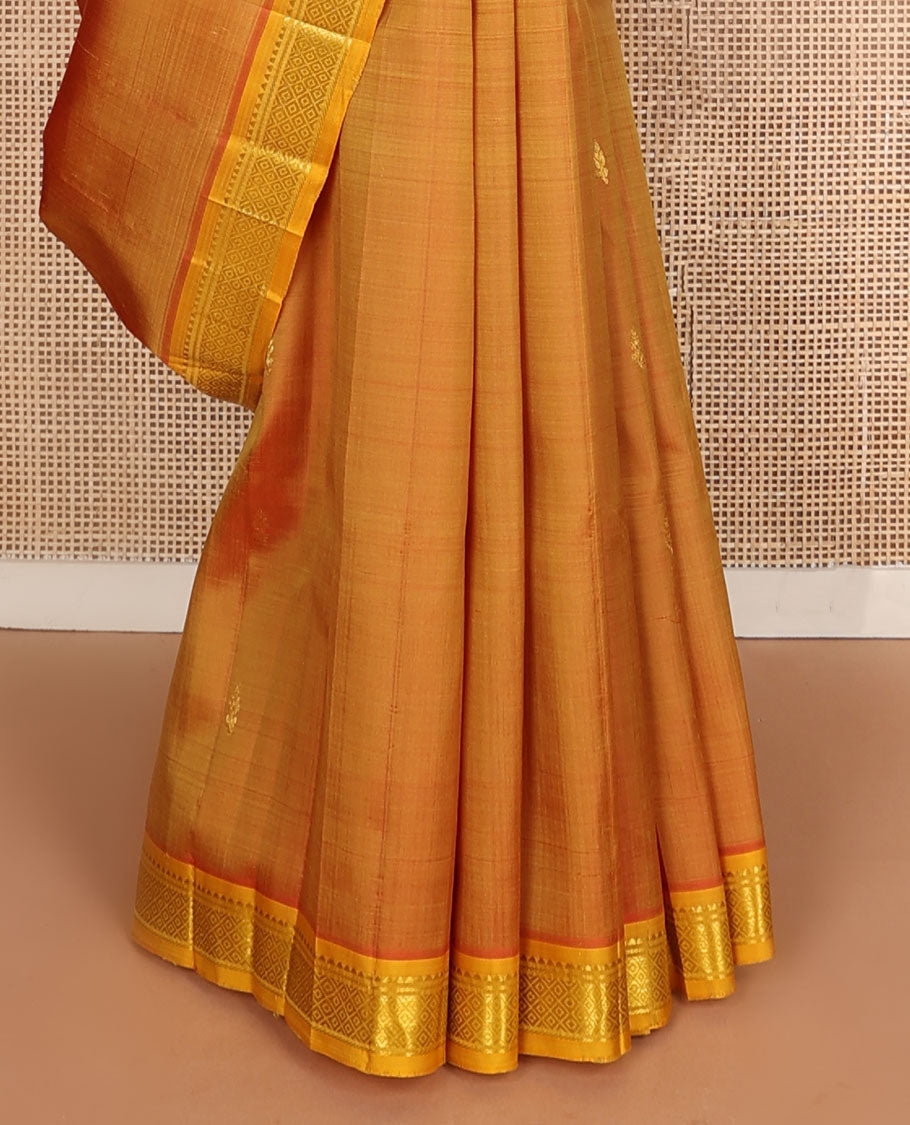 Orange zari buttas kanchipuram silksaree, contrast one-sided border of rekku,banaras & mayil kann designs & zari design pallu