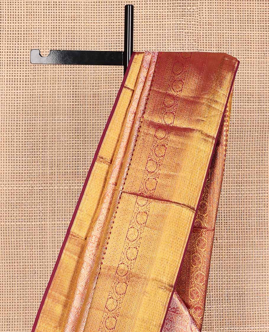 Red jacquard tissue silk saree, ogee-patterned pallu & contrast border of thilakam mokku,muthu,kodi visiry & then kuli kann designs