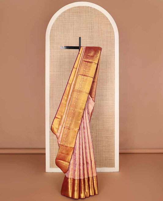 Red jacquard tissue silk saree, ogee-patterned pallu & contrast border of thilakam mokku,muthu,kodi visiry & then kuli kann designs