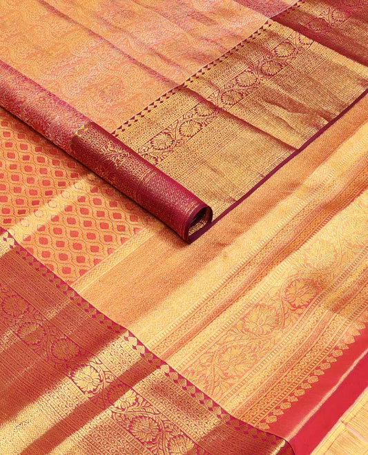Red jacquard tissue silk saree, ogee-patterned pallu & contrast border of thilakam mokku,muthu,kodi visiry & then kuli kann designs