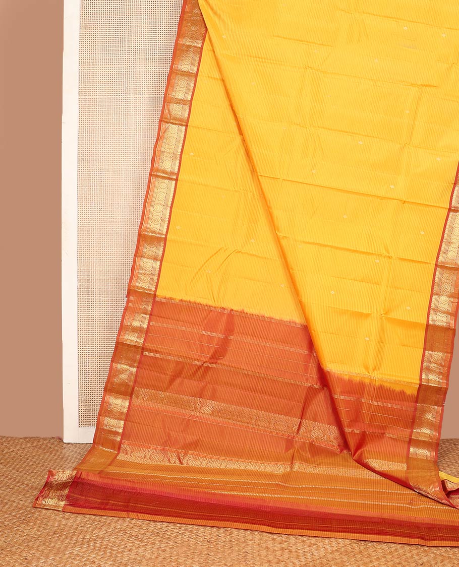Yellow vazhaipoo striped & zari buttas silk saree, contrast border of manga mokku,muthu,chakram, jada nagam & kili & zari design pallu