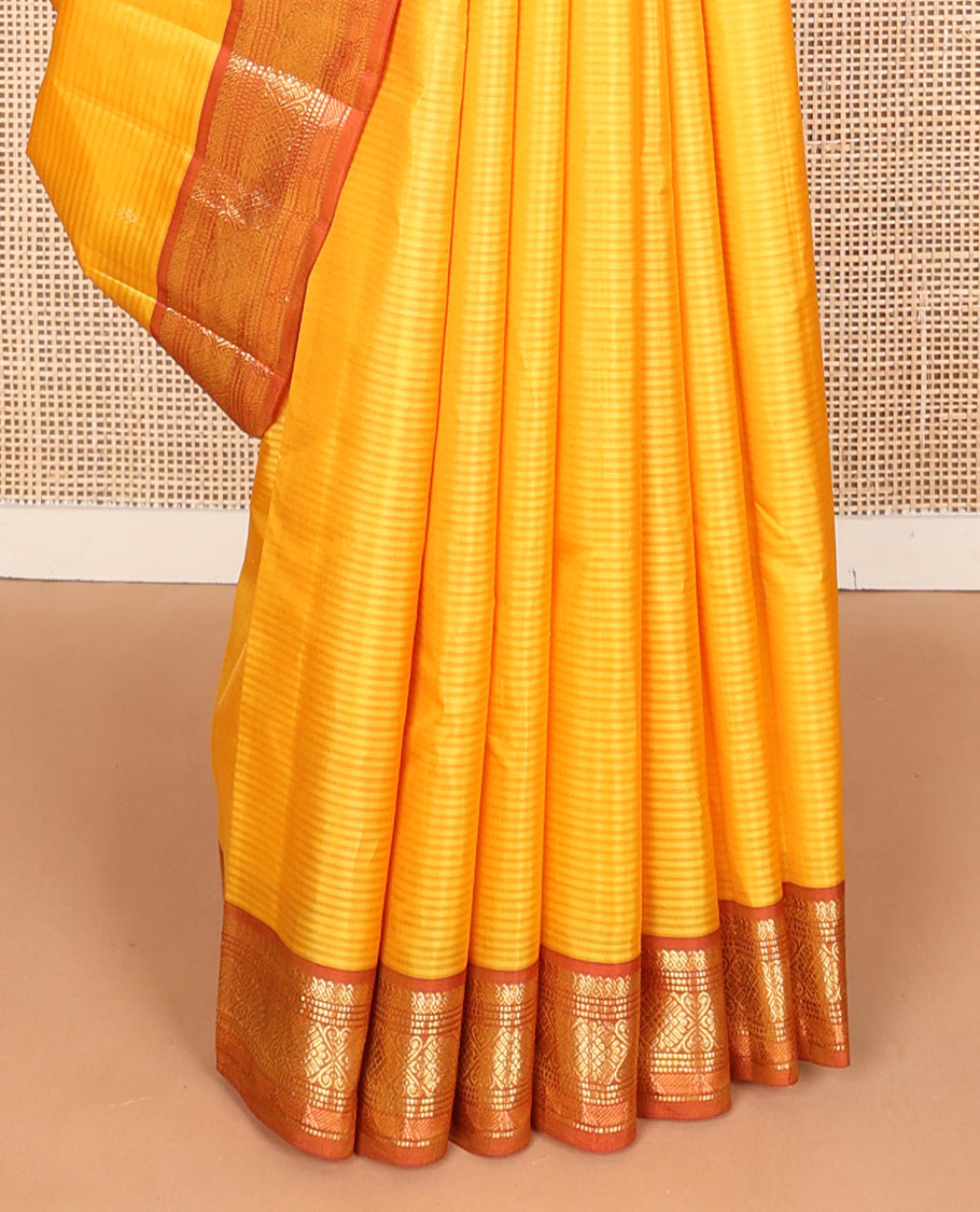 Yellow vazhaipoo striped & zari buttas silk saree, contrast border of manga mokku,muthu,chakram, jada nagam & kili & zari design pallu