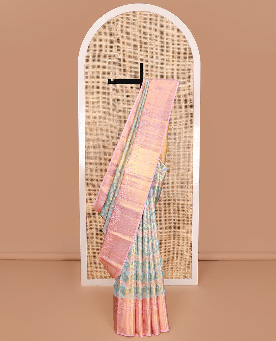 Blue Kanchipuram Tissue Silk Saree, Richly Detailed with Jacquard Design on Its Body, Complemented by a Contrast Border of Traditional Designs in Zari, Pallu Steeped with Poun Designs, and Paired with a Contrast Blouse