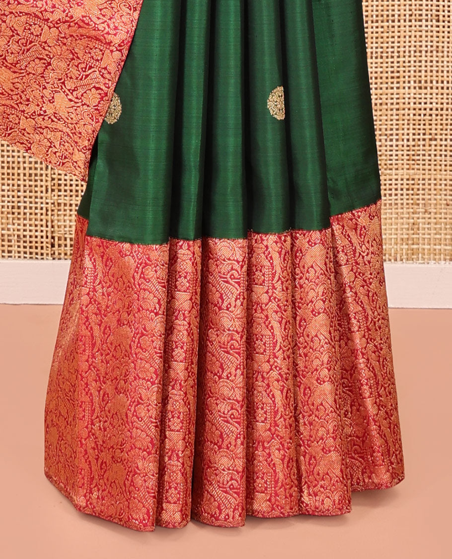 Green Kanchipuram Designer Silk Saree, Entralled with Chakram Buttas All Over Its Body, Complemented by Contrast Historically Woven Border of Yaali and Yaanai Designs, Grand Jaal Pallu and Paired with a Contrast Blouse