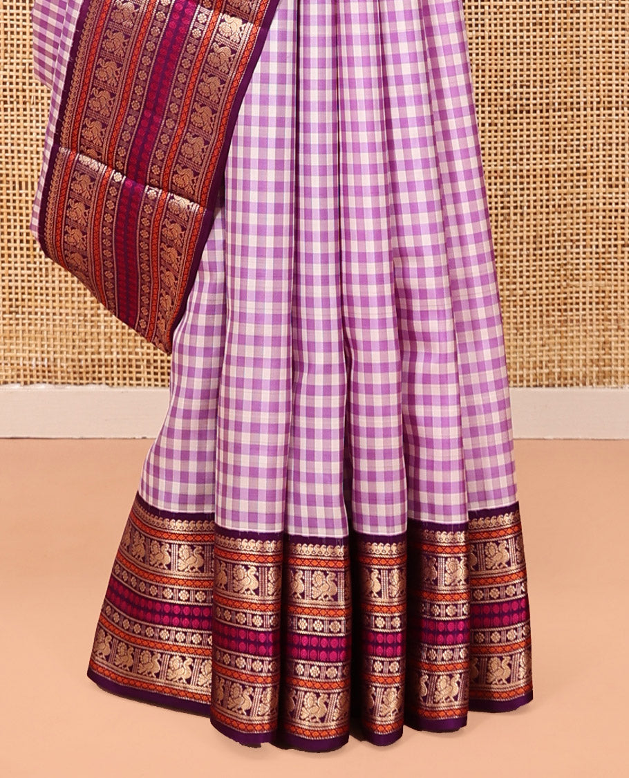 Light Purple Checked Kanchipuram Silk Saree, a Contrast Korvai Border of Manga Mokku, Diamond, Mayil, Kamalam, and Poun Designs, Traditional Pallu, and a Contrast Blouse