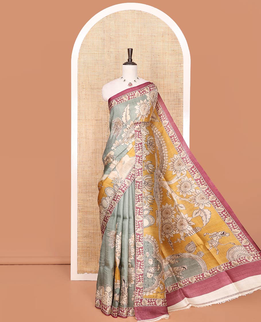 Grey Printed Silk Saree Decked Up with Floral and Ancient Human Motifs Print, Complemented with a Contrast Printed Border, Pallu Beautifully Printed with Lord Krishna and Radha Figurines, and Paired with a Contrast Printed Blouse
