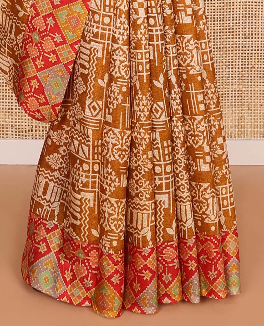 Brown geometric design printed silk saree with ikkat style border & floral ikkat style pallu