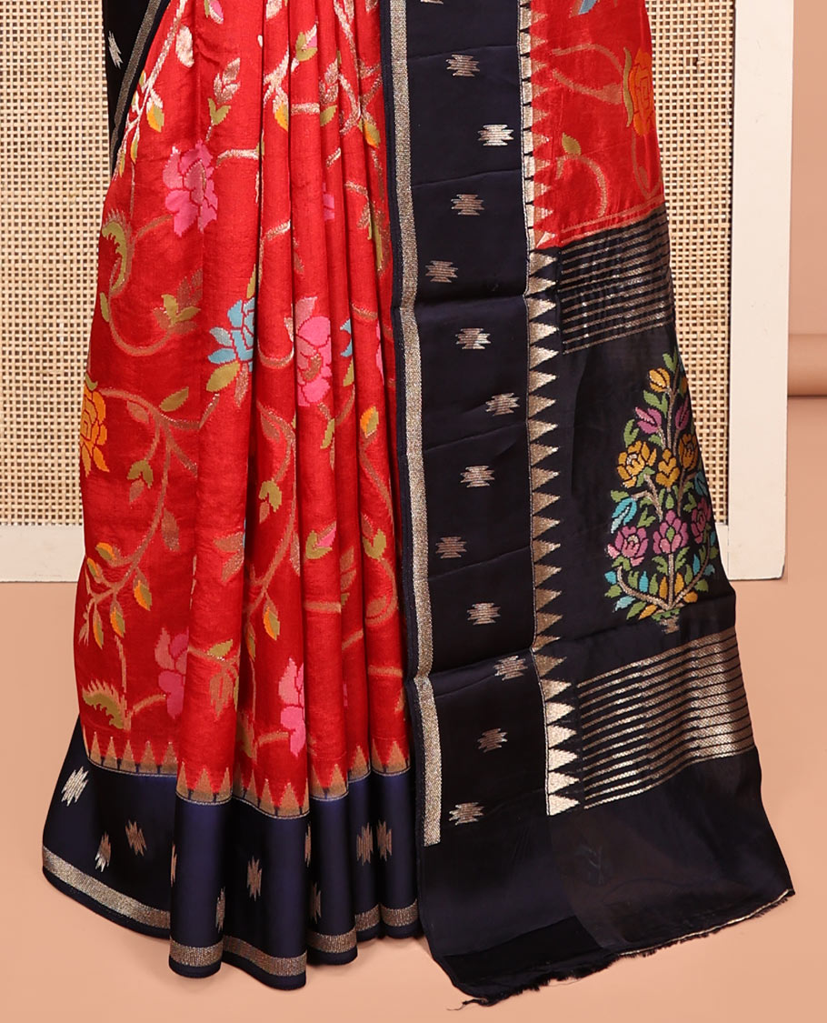 Red Matka Silk Saree, Artfully Detailed with Meenakari Floral Vine Design All Over Its Body, Complemented by Contrast Temple Border of Buttas, Pallu of Floral Designs, and Paired with Contrast Blouse