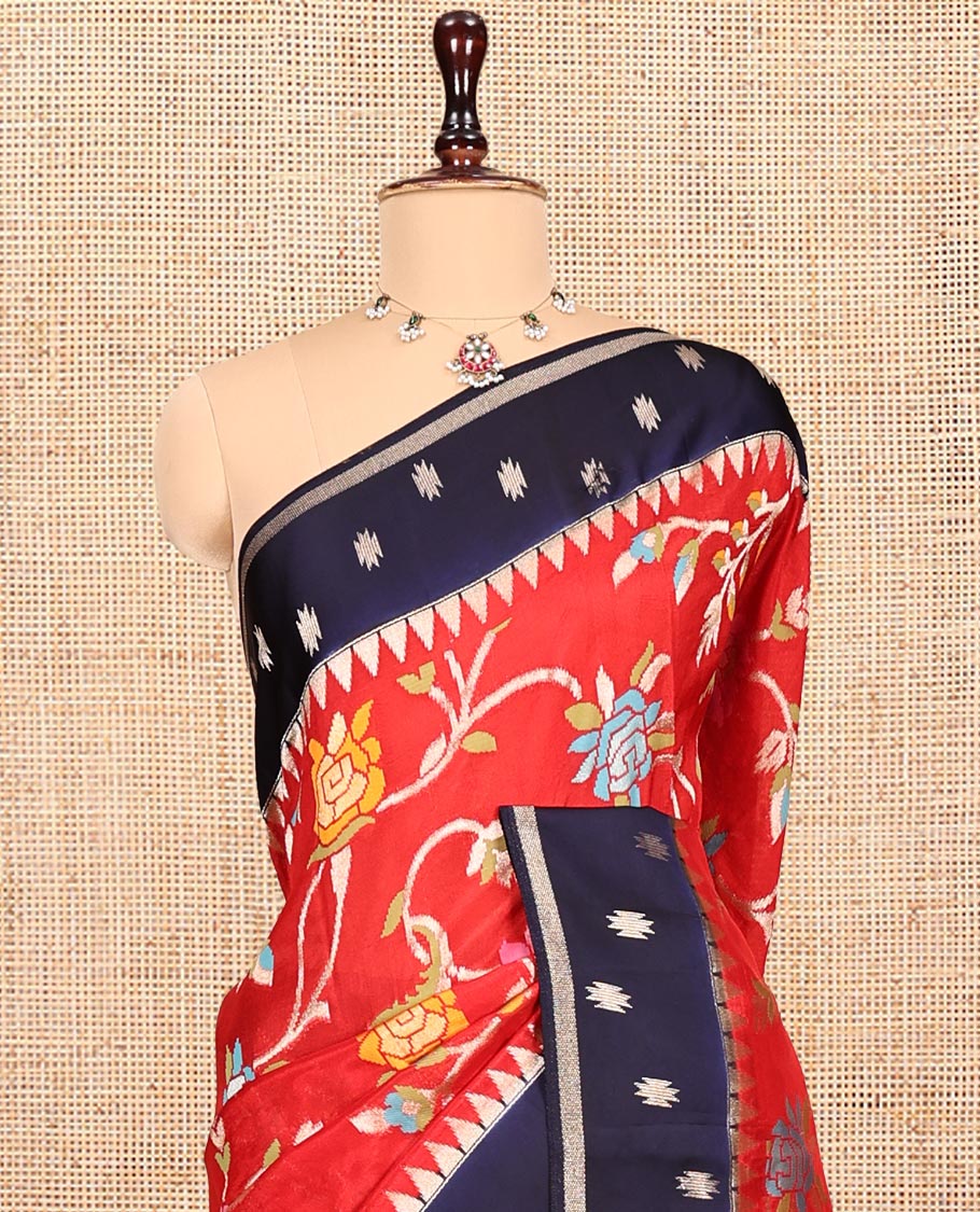 Red Matka Silk Saree, Artfully Detailed with Meenakari Floral Vine Design All Over Its Body, Complemented by Contrast Temple Border of Buttas, Pallu of Floral Designs, and Paired with Contrast Blouse