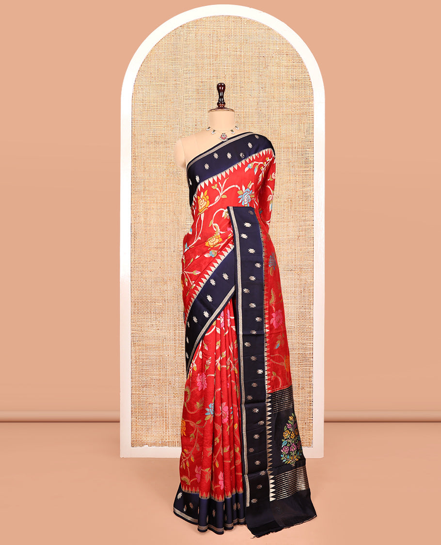 Red Matka Silk Saree, Artfully Detailed with Meenakari Floral Vine Design All Over Its Body, Complemented by Contrast Temple Border of Buttas, Pallu of Floral Designs, and Paired with Contrast Blouse