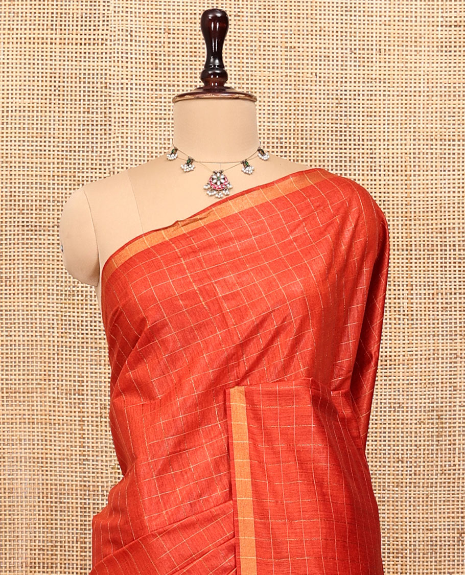 Orange Tussar Silk Saree, Sparsely Threaded with Checks, a Subtle Border, a Striped Pallu, and a Matching Blouse