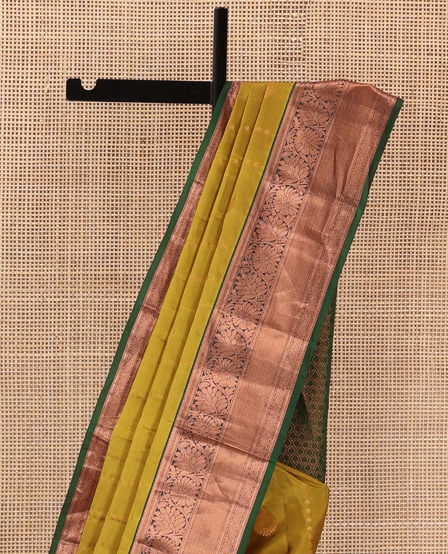 Green zari design Vasundhara silk mix saree, contrast border of rekku, muthu, neli, and kodi visiry design, and ogee patterned pallu