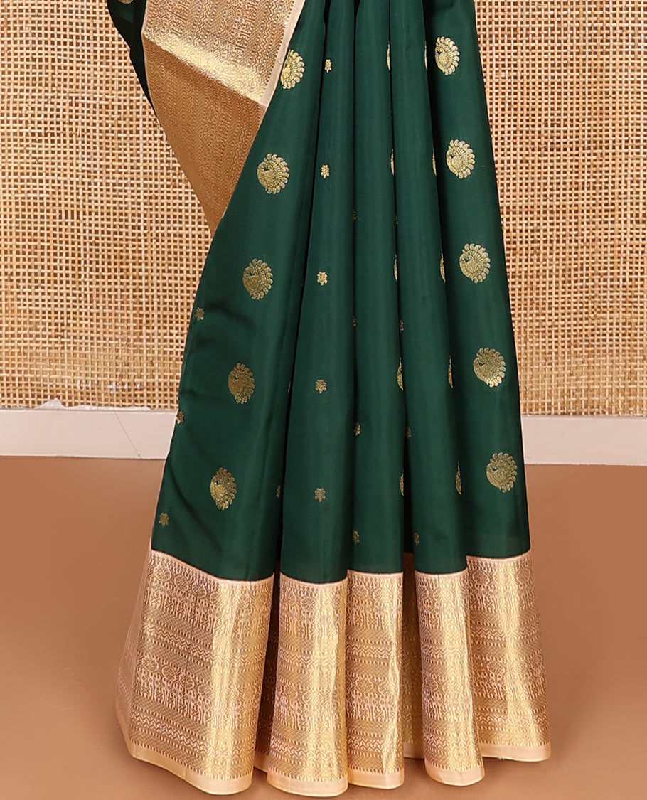 Green Vasundhara Lite Silk Mix Saree Spotlighted with Zari Buttas, Complemented by a Contrast Border Depicting Paneer Sombu, Muthu, Dhavana Kodi, Mayil Kann, Neli, and Lavangam Designs, Featuring a Zari-Elevated Jaal Pallu, Paired with a Contrast Blouse
