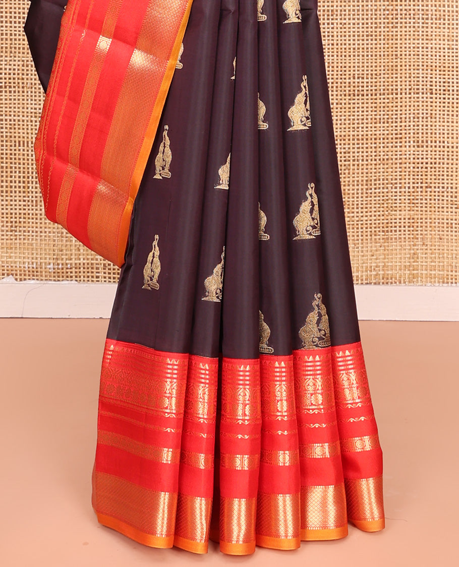 Brown Vasundhara Lite Silk Mix Saree, Delicately Woven with Yaanai Buttas, Complemented by Contrast Border of Rekku, Muthu, Jada Nagam, Laddu Kamalam, Mayil, Rudraksham, and Mayil Kann Designs, Grand Pallu and Paired with a Contrast Blouse