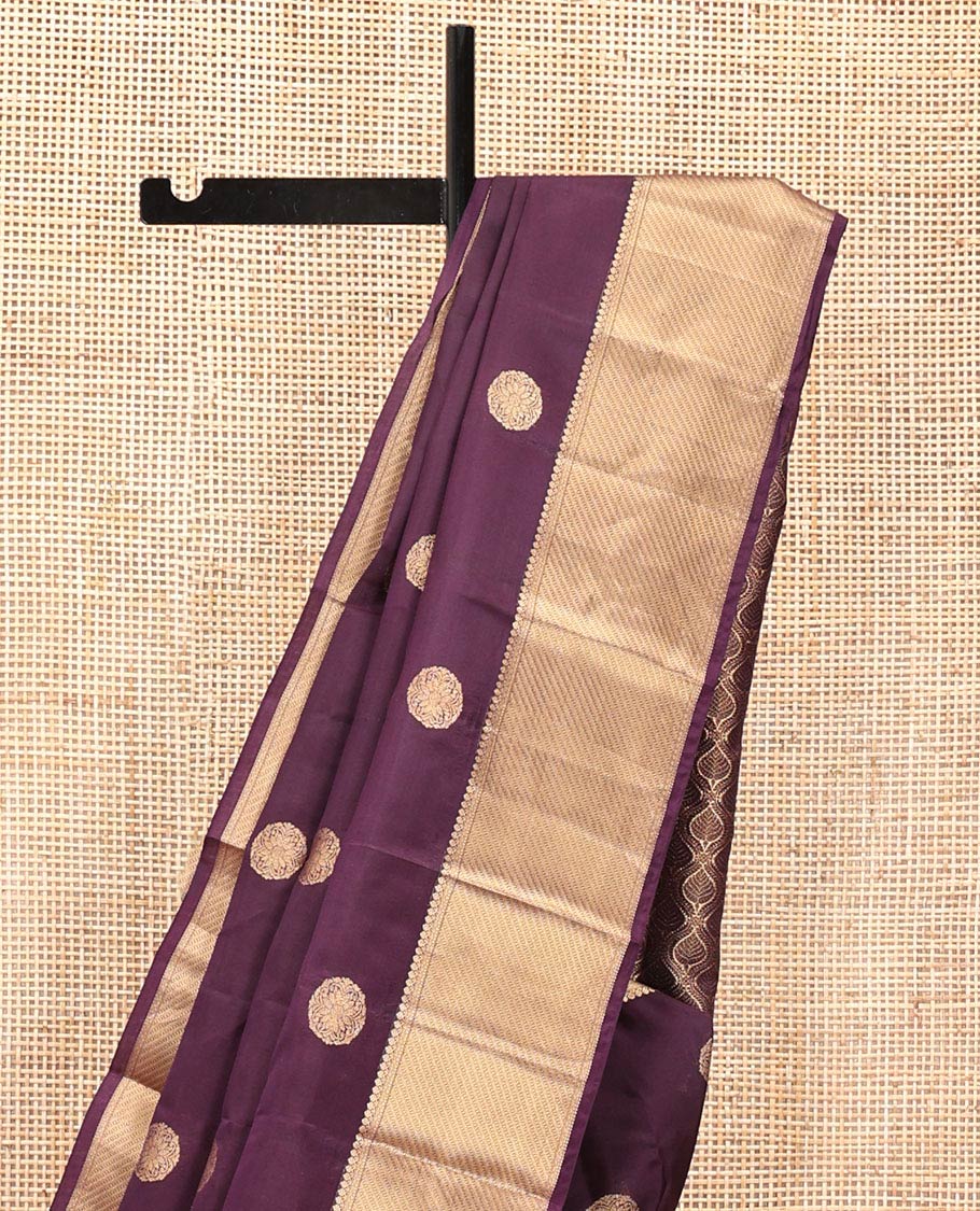 Brown Vasundhara Lite Silk Mix Saree, Detailed with Zari Buttas All Over Its Body, Highlighted by a Zari Border of Thilakam Mokku, Neli, and Muthu Designs, Ogee-Patterned Pallu, and Paired with a Matching Blouse