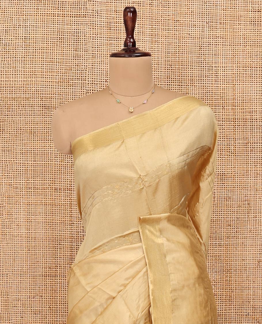 Sandal Banana Pith Saree, Subtly Sparkled with Buttas and Stripes All Over Its Body, Highlighted by Self-Border, Pallu of Zari Stripes, and Paired with a Matching Blouse