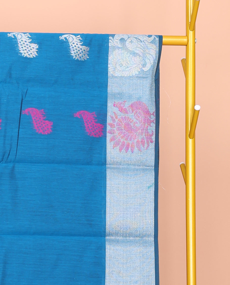 Blue Semi-Silk Cotton Saree, Adorned with Peacock Buttas All Over Its Body, Highlighted by a Self-Border of Peacocks, Pallu Steeped with Peacock Designs, and Paired with a Matching Blouse